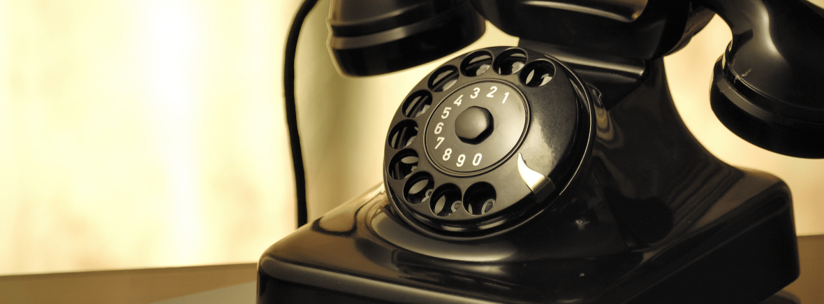 A photograph of an old-fashioned telephone