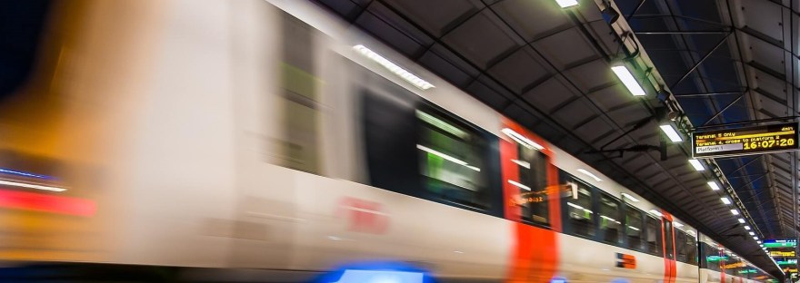 Picture of a London Underground train passing through a station
